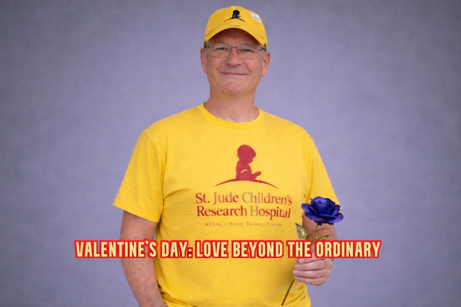 Rick Ollie in a yellow St. Jude Children’s Research Hospital shirt and cap holding a blue rose, symbolizing hope, healing, and Valentine’s Day support for cancer awareness.
